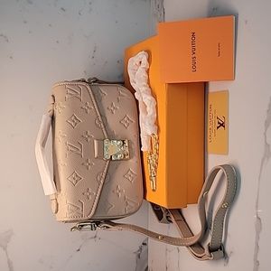 Mini Pochette Métis Monogram